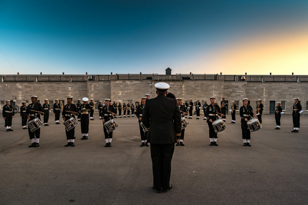 Military band in black uniform performing